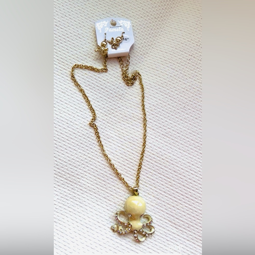 Octopus 16” necklace & earrings set, never off the card, gold tone, pierced ears